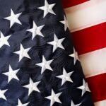Detailed view of the American flag's stars and stripes representing USA patriotism.